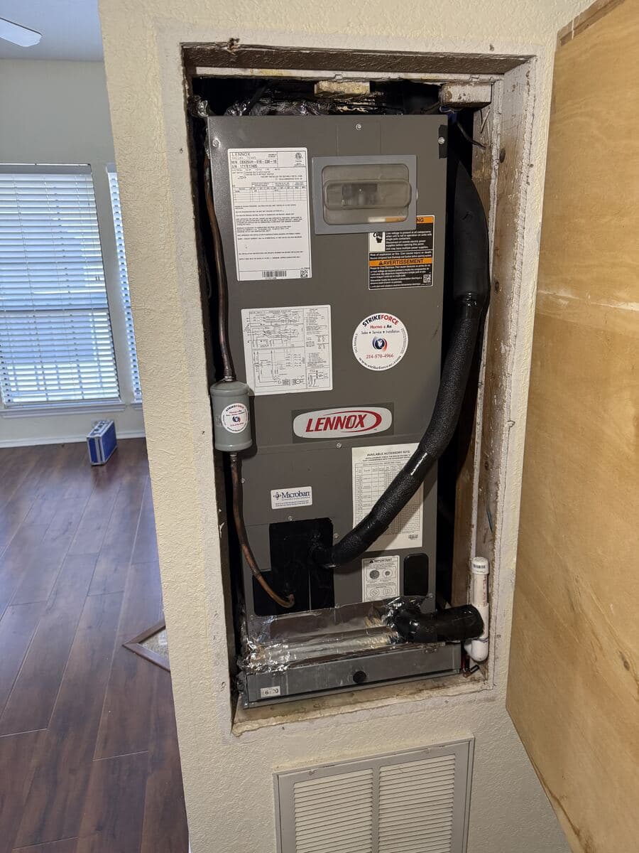 Lennox air handler installed in a hallway closet during a system replacement