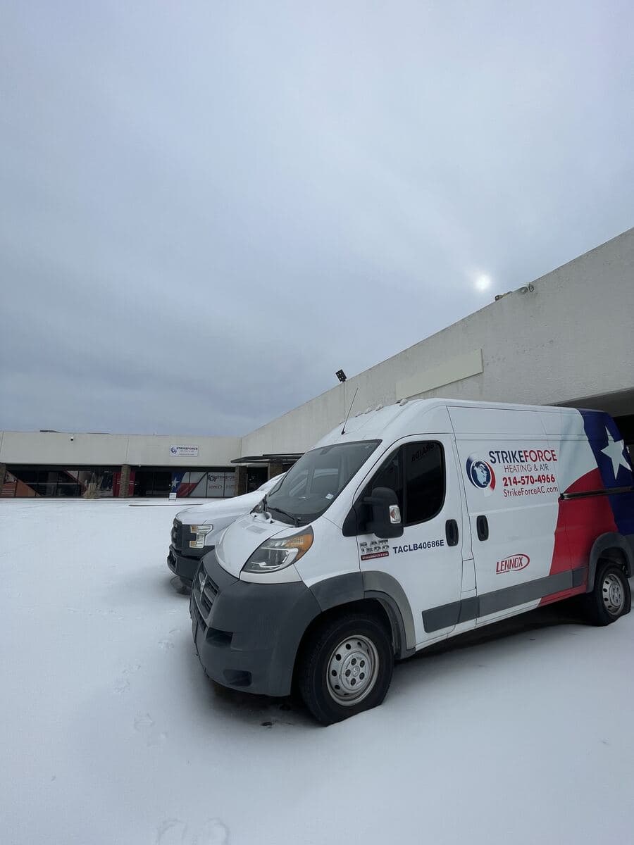 Strike Force Heating & Air yard sign at the company's Dallas office